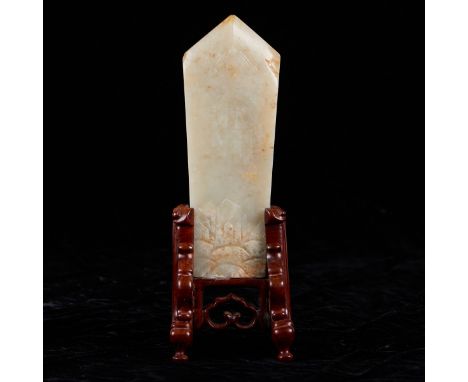 Chinese carved jade Kuei in an elongated pentagonal shape. Both sides with matching carved geometric motifs. On a custom wood