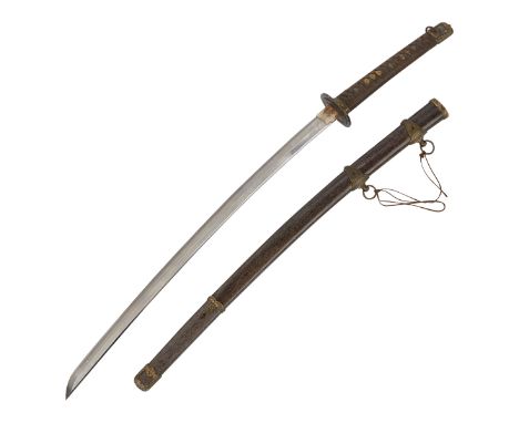 World War II Japanese kai gunto sword with sheath. Swords of this kind were produced for the Imperial Japanese navy and army 