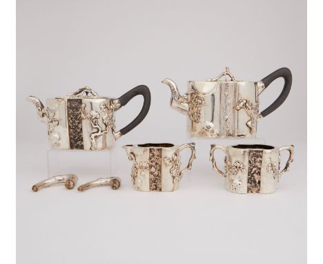 One late Qing Dynasty Chinese export silver tea service set by Hong Chong &amp; Co. Well worked with deep relief decoration a