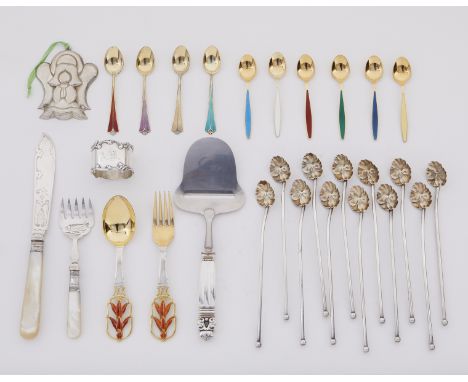 Group of sterling silver objects including one angel ornament, 10 small spoons, 11 mint julep spoons, one cheese slicer, one 