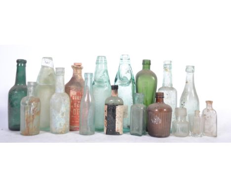 A collection of vintage glass bottles of various forms (please see images)