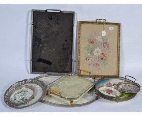 A collection of vintage serving trays and coasters to include Victorian tapestry examples and various others.