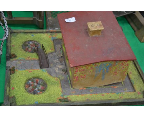 A scratch built play house and garden along with a vintage bagatelle board