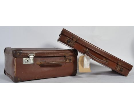 A vintage slim leather attaché case along with another leather suitcase