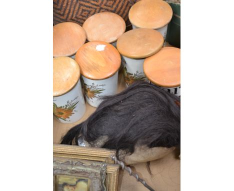 A mixed lot to include a group of kitchen storage jars , small religious pictures , vintage dummy / mannequin head etc.
