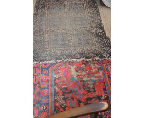 Two late 19th / early 20th century Persian style rugs, the first with red ground  and foliate designs with another