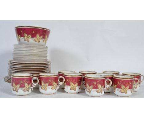 An early 20th Century 10 person part tea service in red autumn pattern  (3518) consisting of 10 trios , 2 sandwich plates and
