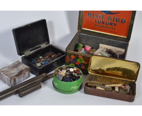 A good selection of vintage sowing equipment to include needles, buttons etc. some mother of pearl examples all held within a