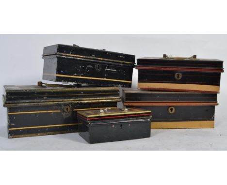 A good group of vintage cash / money box tins of different sizes most with inserts