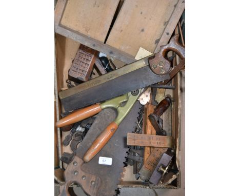 A good collection of vintage tools to include saws , chisels , rules etc.
