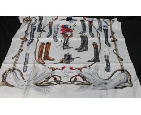 A vintage silk Hermes scarf with riding accoutrements design marked 'A Propos de Bottes' by Xavier de Poret together with a b