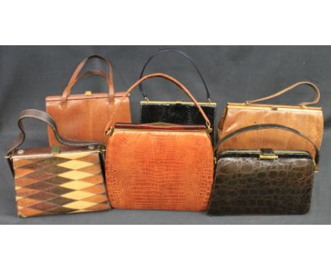 Six vintage reptile skin bags to include a brown lizard or karung skin bag with suede interior, a brown crocodile skin bag wi