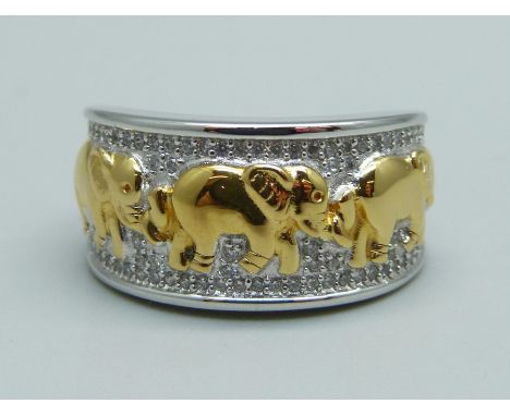 A silver ring with elephant detail, R 