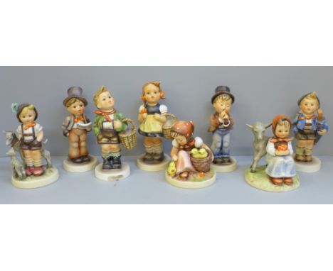 Eight Hummel/Goebel figures, two a/f, small chip to umbrella and to base 