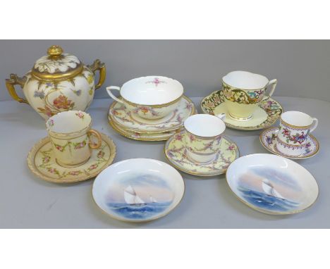 A collection of Royal Worcester porcelain including cups and saucers, trios, sugar pot, pin dishes 