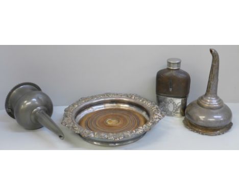 Two early 19th Century wine funnels, a plated wine coaster and a small hip flask 