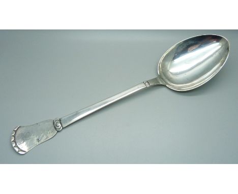 A large Arts and Crafts Danish silver basting spoon, Christian F. Heise, 1904-1932, 147g, 36cm 