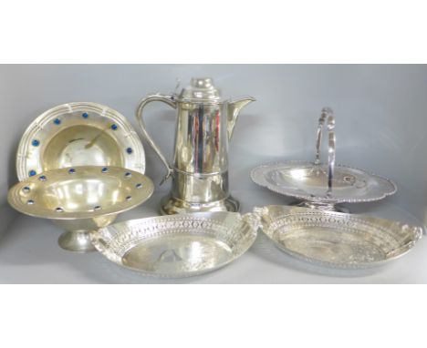 A large EPNS jug in Arts and Crafts style together with a pair of continental EPNS and enamel bowls, etc. 