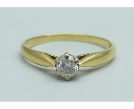 An 18ct gold, 0.2ct diamond solitaire ring, 2g, M 