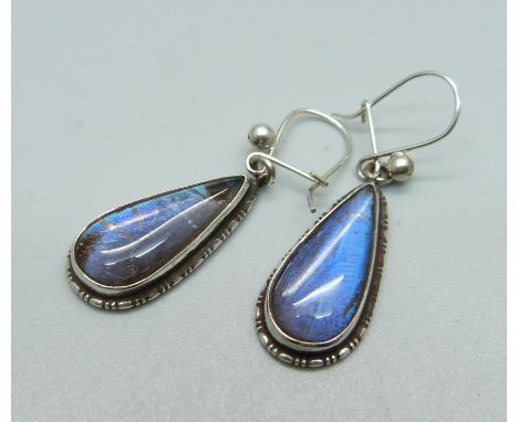 A pair of silver butterfly wing earrings 