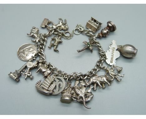 A silver charm bracelet, 73g 