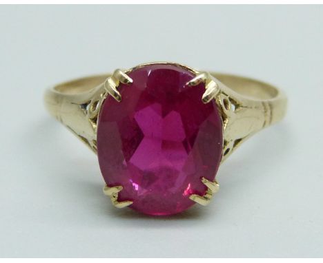 A 9ct gold and ruby solitaire ring, 1.9g, M 