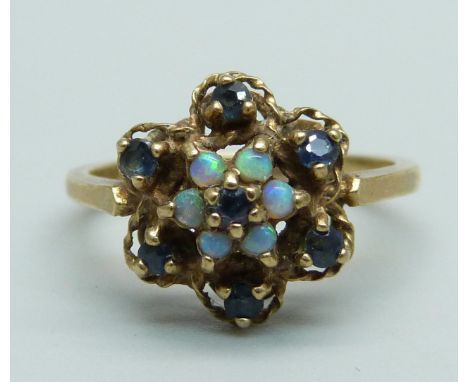 A 9ct gold cluster ring set with sapphires and opals, 2.5g, M 