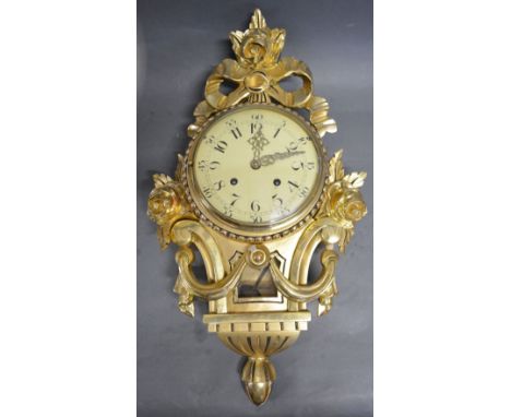 A 20th Century Giltwood Cartel Clock, the dial with Roman and Arabic numerals and two train movement and with bow gilded cres