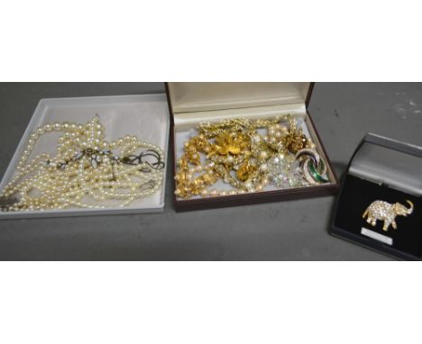 A Collection of Costume Jewellery to include Brooches, Simulated Pearl Necklaces and other items