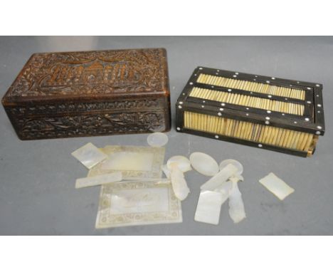 A Small Collection of Mother of Pearl Counters, together with an Indian carved hardwood box and a porcupine quill box