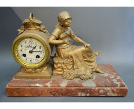 A 19th Century French Gilded Mantle Clock with Figural Surmount, the enamel dial hand painted with summer flowers and with tw