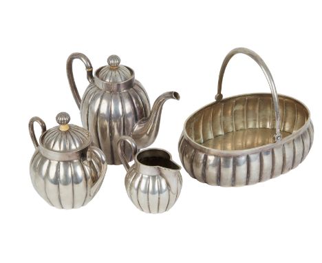  A FOUR PIECE RUSSIAN SILVER TEA OR COFFEE SERVICE, CYRILLIC MAKERS MARK GS, MOSCOW, 1899-1908  comprising of a lidded tea po