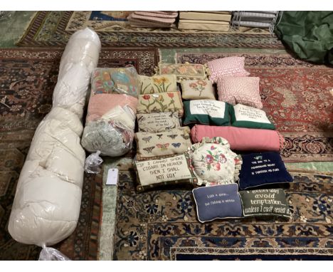 A quantity of cushions, including needlepoint tapestry and fun slogans pillows and cushions, cushion fillers and loose covers