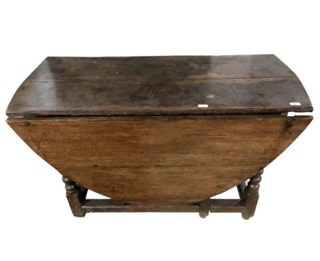 a quantity of general clearance furniture, as found, no guarantees, a table 2 chairs, chest of drawers, armchair, two stands