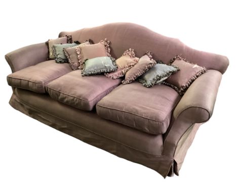 Three seater pink upholstered sofa 209cm wide x 104cm depth x 85cm high, loose wheel, some marks and some wear and fading. Pa
