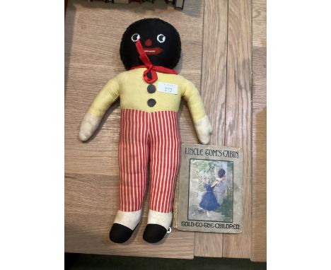 A Vintage "Golly Doll" from a by gone era, and an early Uncle Toms Cabin Book Notice from the the-saleroom.com: These items a