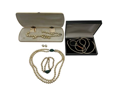A vintage matching pearl bracelet and double row pearl necklace, each with a blue and green stone decorative clasp; and a pai