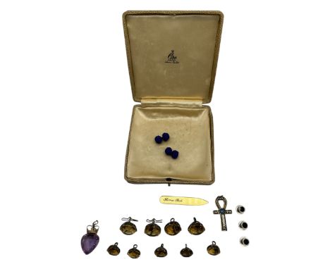 A mixed clearance lot to include a gold and amethyst pendant, a celtic cross pendant and citrine coloured studs, and other st
