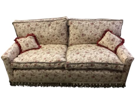A Two seater sofa with Geoffrey Bennison upholstery, 180cm wide x 90cm depth x ca 95cm high, general wears. Part of the Eaton