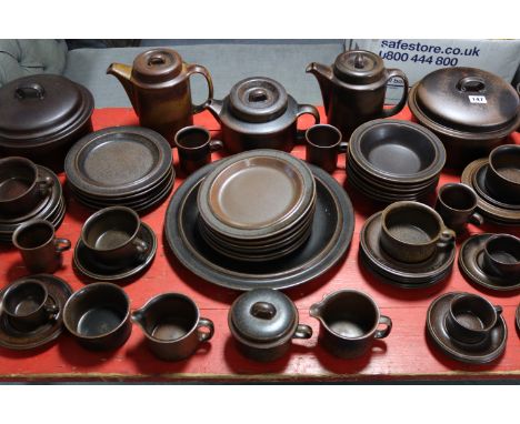 A Finnish brown glazed pottery “Arabia” extensive one hundred &amp; ten piece dinner, tea &amp; coffee service.