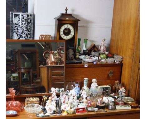 A battery-operated mantel clock; a pottery cylindrical stick stand; various decorative ornaments, etc. 