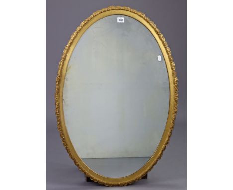 A gilt frame oval wall mirror, 32” x 22½”; &amp; a reprinted black &amp; white vintage Rolls-Royce car design, 15” x 23¾”, in