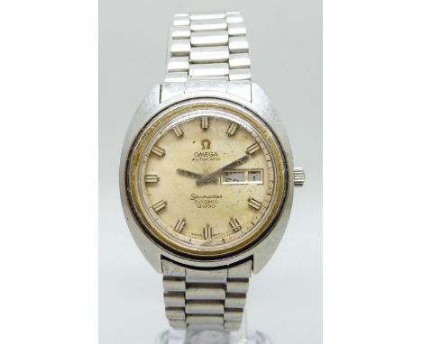 An Omega Automatic Seamaster Cosmic 2000 with day/date aperture, case back with inscription dated 1978, second hand loose, 38