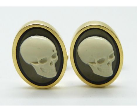 A pair of Paul Smith skull cufflinks 