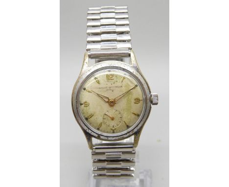 A Baume &amp; Mercier stainless steel wristwatch, subsidiary second hand, with inscription to case back dated 1955, 34mm incl