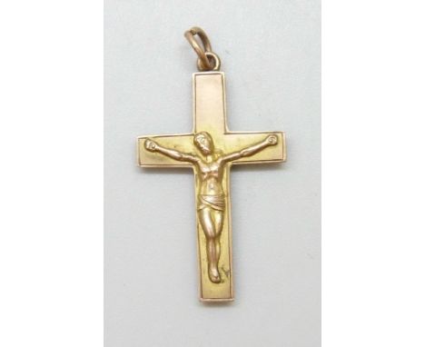 A 9ct gold crucifix pendant, 0.9g, 3.1cm including bale