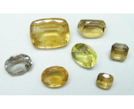 A collection of gemstones including citrine, 25g, and a paste stone