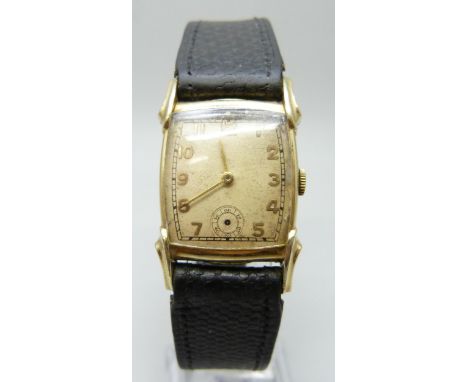 An Art Deco Elgin wristwatch, gold plated case, manual wind movement, on a black leather strap