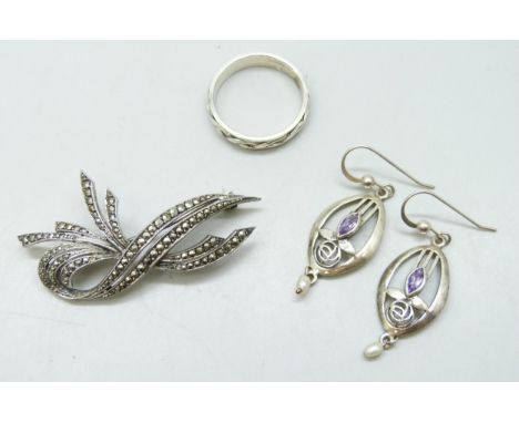 A pair of silver Rennie Mackintosh style earrings, a silver brooch, and a Celtic silver ring, S