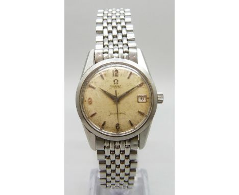 An Omega Automatic Seamaster wristwatch with date aperture, sweep second hand, 35mm including crown